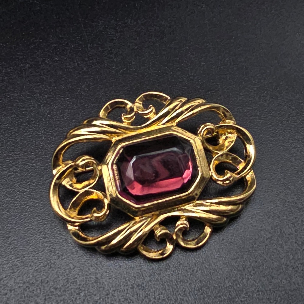 Avon Purple Rhinestone Brooch Gold Tone Scroll Vintage Costume